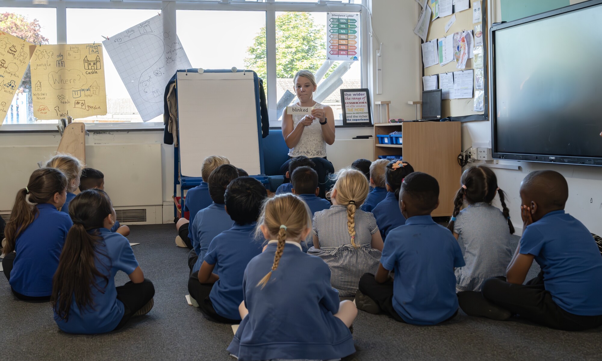 Elmhurst school classroom lesson with students listening attentively